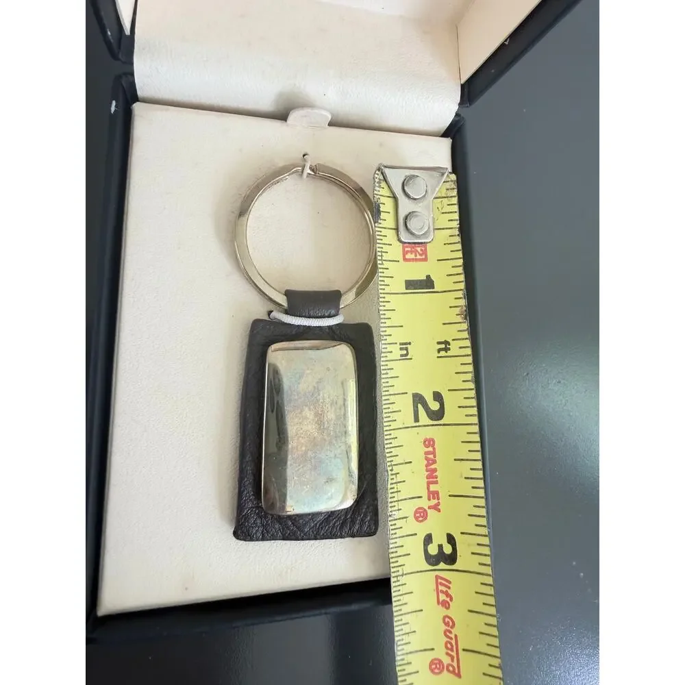 Vintage Monet for Men leather & metal keychain in its original branded box